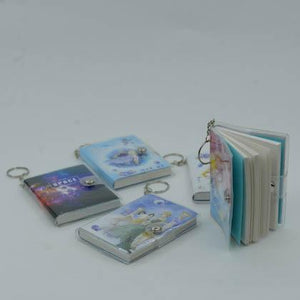 نوت-صغير-بغلاف-شفاف-ميدالية-BookBuzz